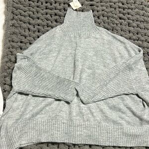 New with tags Dolman style gray sweater. Worldmarket.